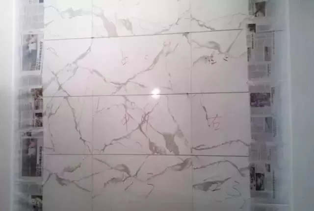 0cm,邊緣線離牆10cm),交點處用1:2砂漿打餅(梯台上口50×50